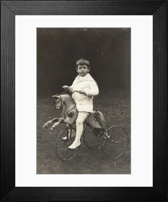 Framed Print : Boy on a wheeled horse Framed Print : Boy on a wheeled horse