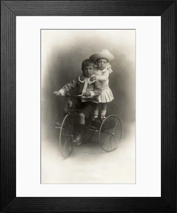 Framed Print : Children on a tricycle Framed Print : Children on a tricycle