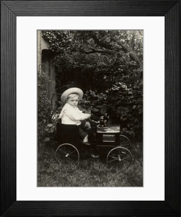 Framed Print : Young boy in an elegant toy car Framed Print : Young boy in an elegant toy car