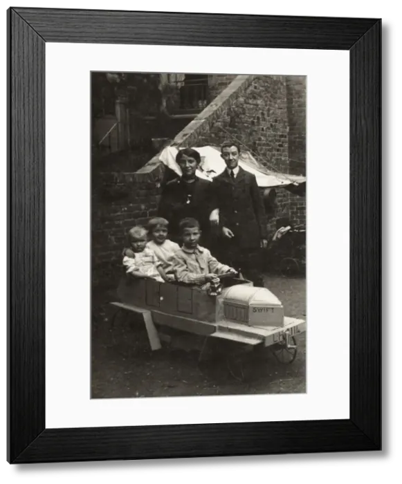 Framed Print : Family photo with children in Go-cart Framed Print : Family photo with children in Go-cart