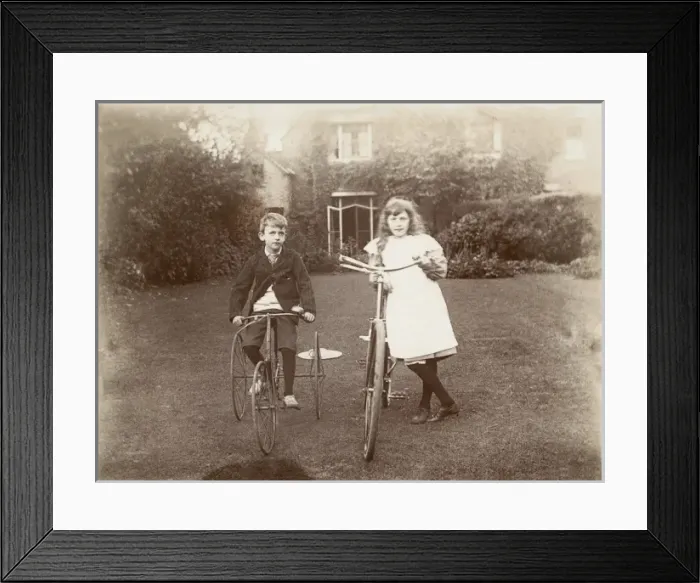 Framed Print : Brother and Sister with their cycles Framed Print : Brother and Sister with their cycles