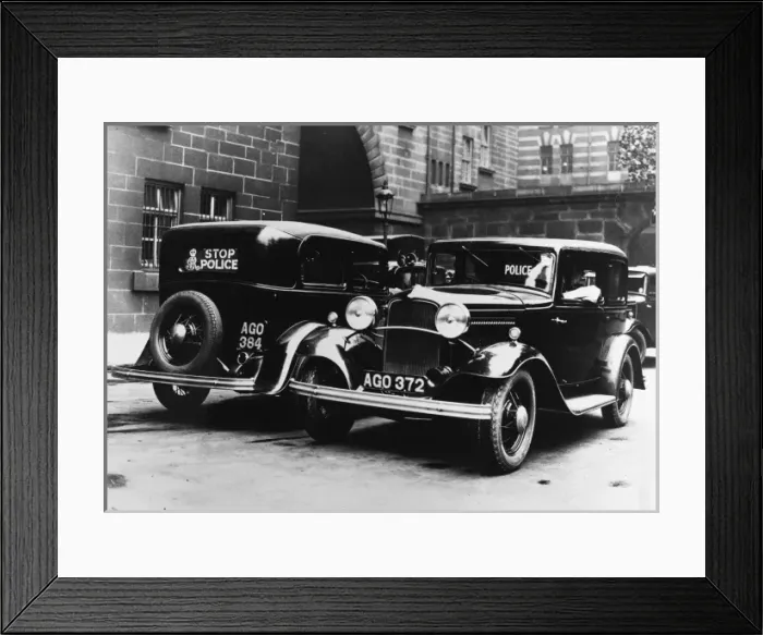 Framed Print : Police cars parked outside a station Framed Print : Police cars parked outside a station
