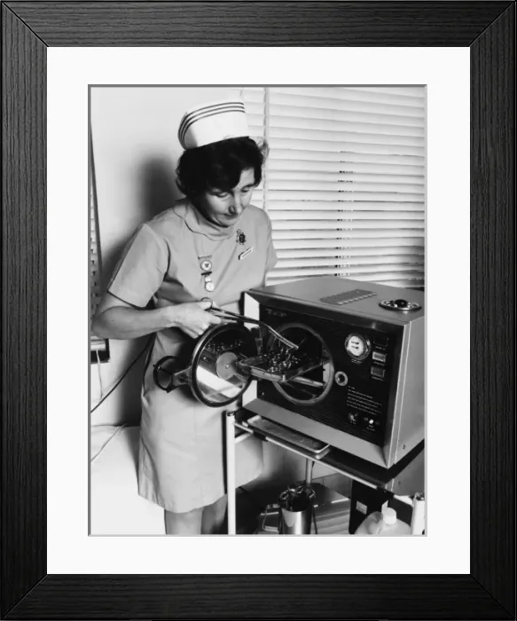 Framed Print : Nurse with equipment at the Medical Centre, Hendon Framed Print : Nurse with equipment at the Medical Centre, Hendon