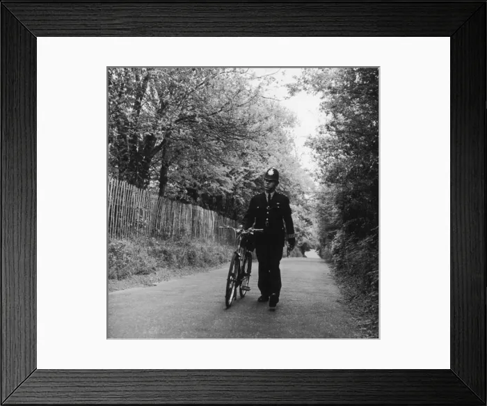 Framed Print : Met Police officer on a country lane Framed Print : Met Police officer on a country lane