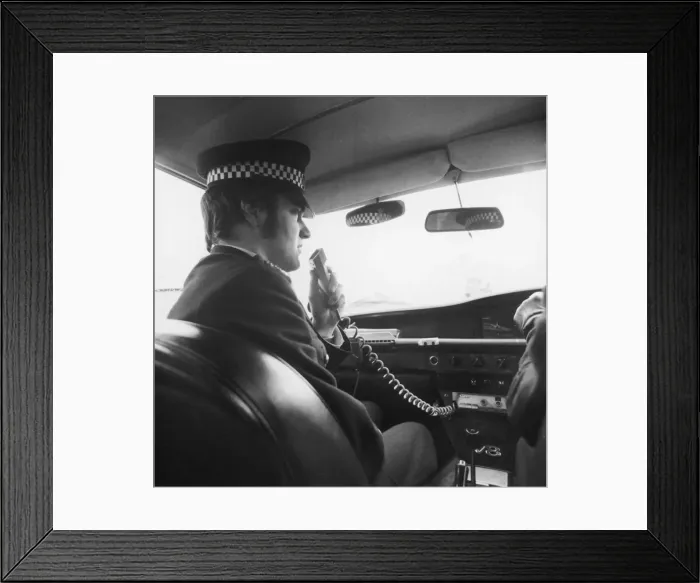 Framed Print : Met Police officer on his car radio Framed Print : Met Police officer on his car radio
