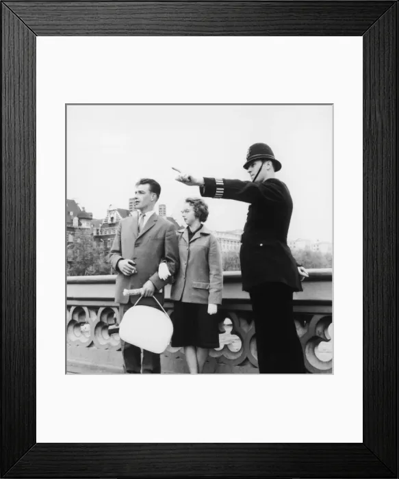 Framed Print : Met Police officer giving directions Framed Print : Met Police officer giving directions