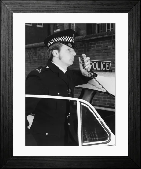 Framed Print : Met Police officer on his car radio Framed Print : Met Police officer on his car radio