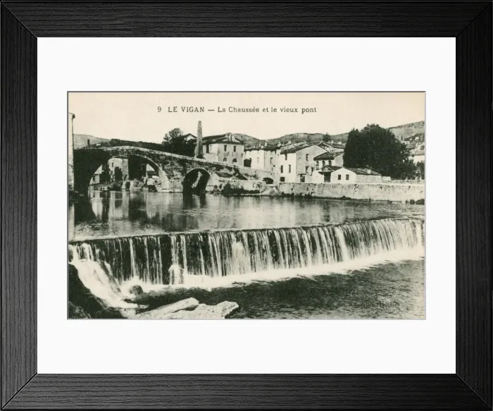 Framed Print : Le Vigan, France - Riverbank and the Old Bridge Framed Print : Le Vigan, France - Riverbank and the Old Bridge