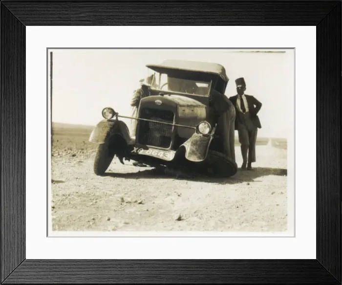 Framed Print : Car with broken wheel in the desert, Middle East Framed Print : Car with broken wheel in the desert, Middle East