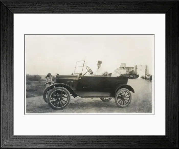 Framed Print : Car with driver, mother and baby, Middle East Framed Print : Car with driver, mother and baby, Middle East