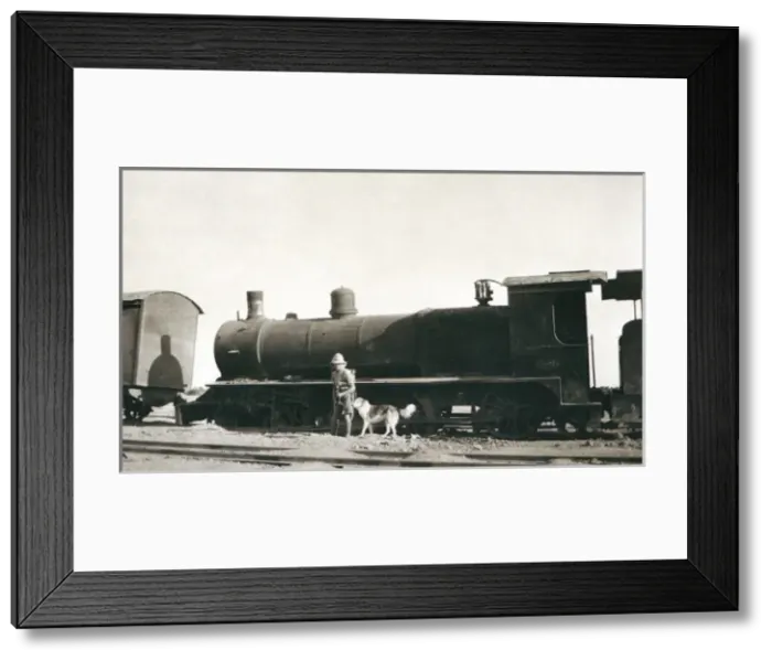 Framed Print : Soldier inspecting sabotaged train, Iraq Framed Print : Soldier inspecting sabotaged train, Iraq