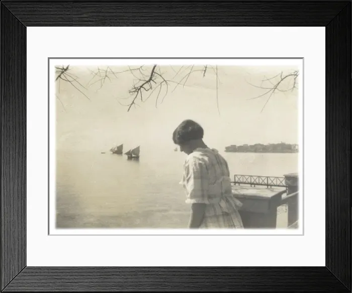 Framed Print : European woman near a river, Middle East Framed Print : European woman near a river, Middle East