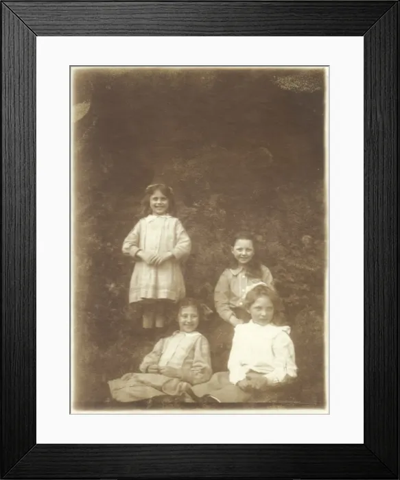 Framed Print : Four girls smiling in a garden Framed Print : Four girls smiling in a garden