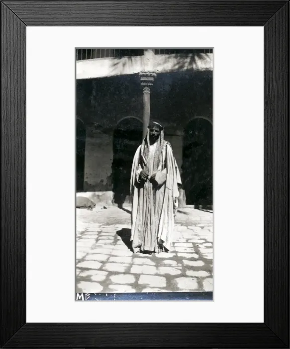 Framed Print : Arab man in a courtyard, Middle East Framed Print : Arab man in a courtyard, Middle East
