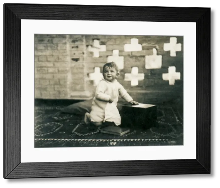 Framed Print : Young child on an exotic rug, Middle East Framed Print : Young child on an exotic rug, Middle East