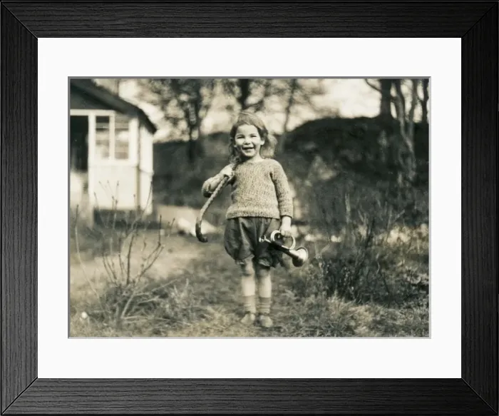 Framed Print : Little girl with walking stick and toy bugle, Scotland Framed Print : Little girl with walking stick and toy bugle, Scotland