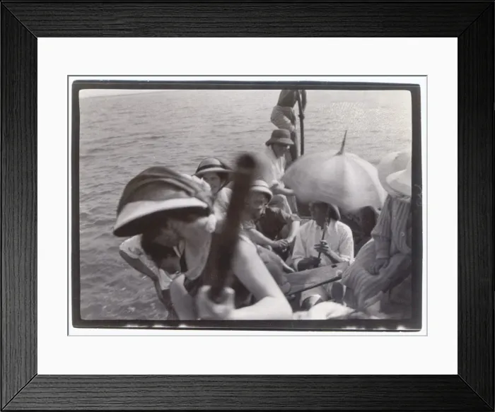 Framed Print : People on an outing in a punt, Middle East Framed Print : People on an outing in a punt, Middle East