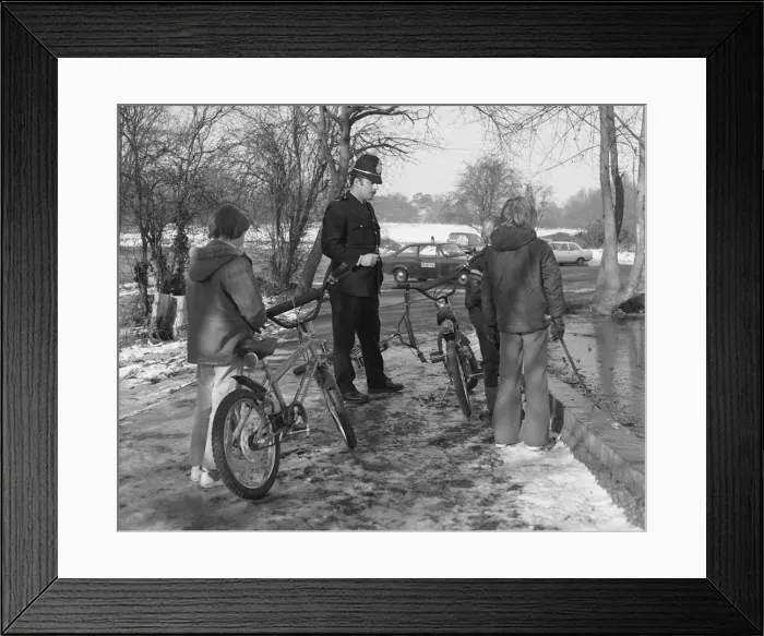 Framed Print : Policeman with three boys and their bicycles Framed Print : Policeman with three boys and their bicycles