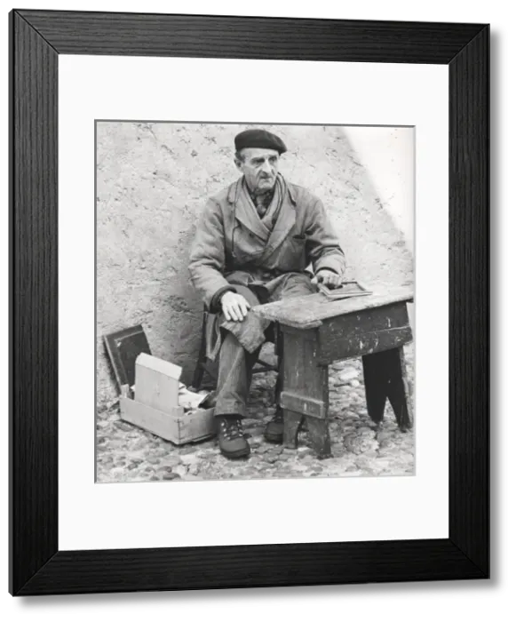 Framed Print : Old man working on the street Framed Print : Old man working on the street