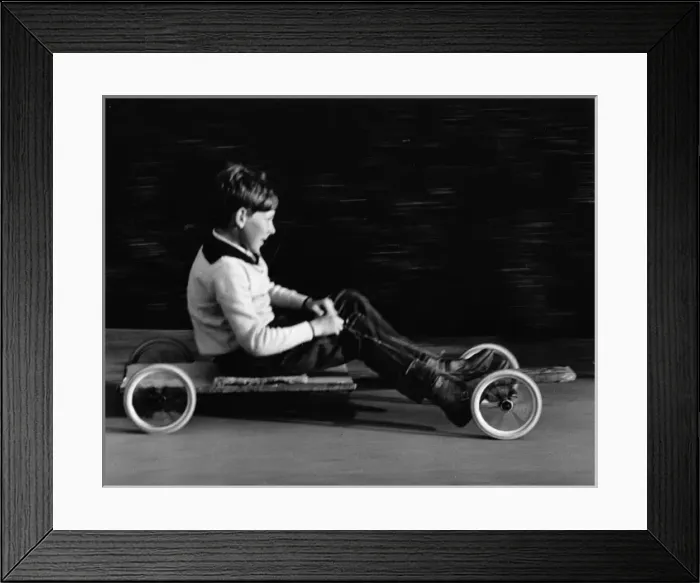 Framed Print : Boy on a home-made go-kart Framed Print : Boy on a home-made go-kart