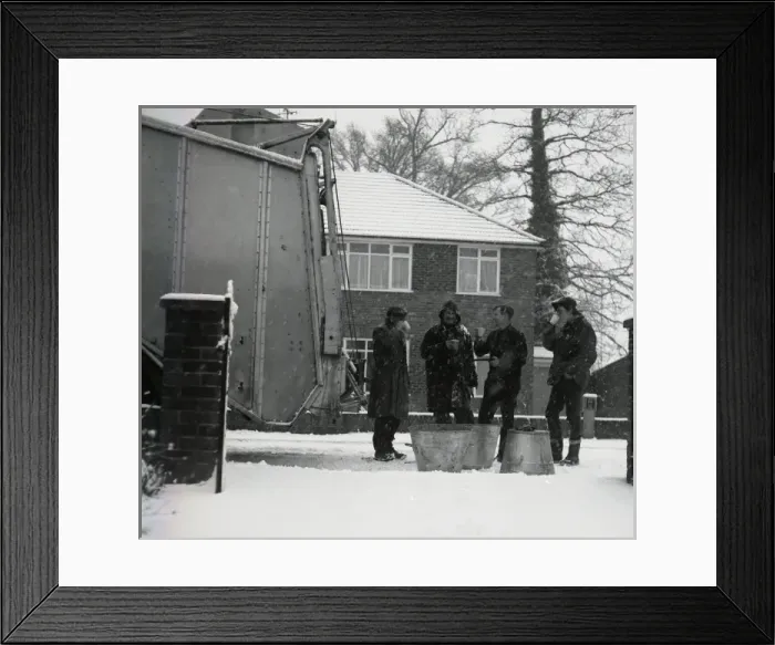 Framed Print : Four workmen stop for a cup of tea on a snowy day Framed Print : Four workmen stop for a cup of tea on a snowy day