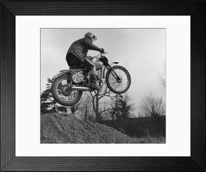 Framed Print : Motorcyclist taking off into the air Framed Print : Motorcyclist taking off into the air