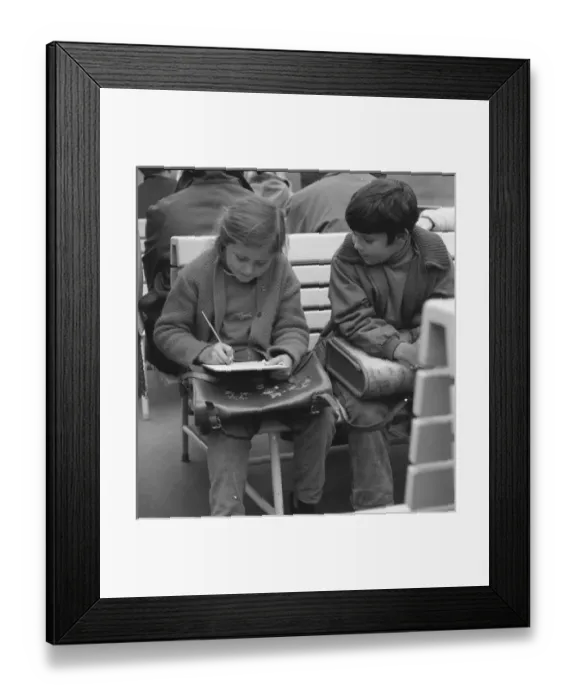 Framed Print : Girl and boy with their school satchels Framed Print : Girl and boy with their school satchels
