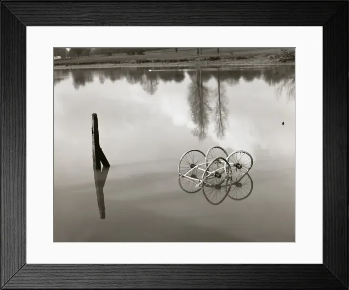 Framed Print : Set of old pram wheels in a pond Framed Print : Set of old pram wheels in a pond