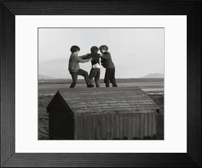 Framed Print : Three boys playing on top of a wooden shed Framed Print : Three boys playing on top of a wooden shed