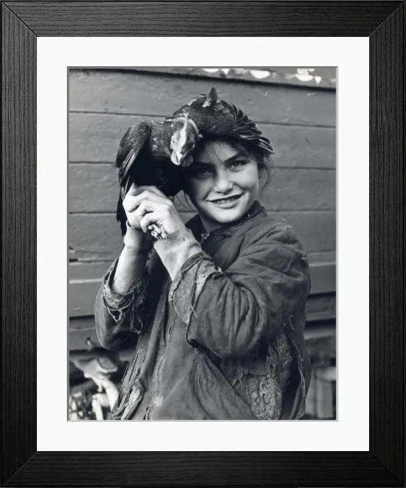 Framed Print : Smiling gipsy girl holding a chicken Framed Print : Smiling gipsy girl holding a chicken
