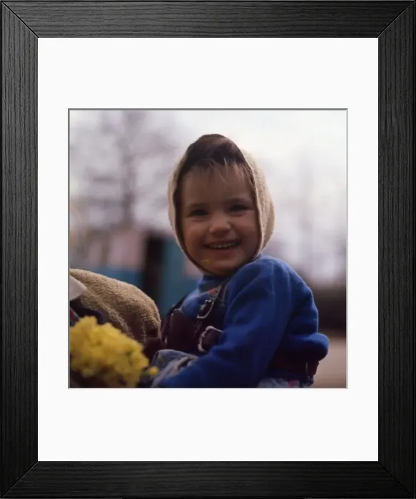 Framed Print : Little gipsy girl with yellow flowers, Charlwood, Surrey Framed Print : Little gipsy girl with yellow flowers, Charlwood, Surrey