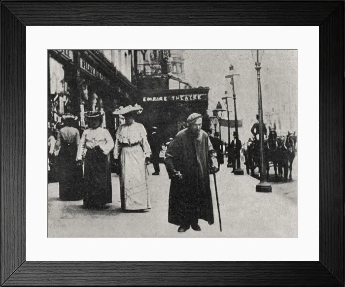 Framed Print : Tramp outside Empire Theatre, Leicester Square, London Framed Print : Tramp outside Empire Theatre, Leicester Square, London