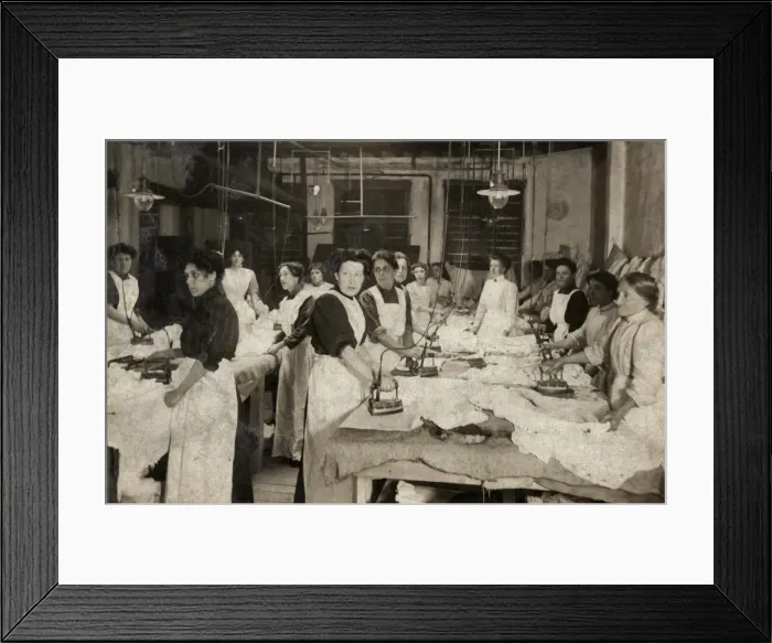 Framed Print : Women ironing bed linen Framed Print : Women ironing bed linen