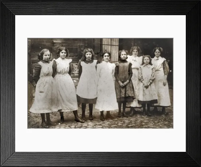 Framed Print : Girls outside a (clothes-making?) workshop Framed Print : Girls outside a (clothes-making?) workshop