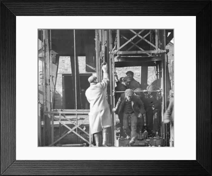 Framed Print : Miners getting out of a shaft lift, South Wales Framed Print : Miners getting out of a shaft lift, South Wales