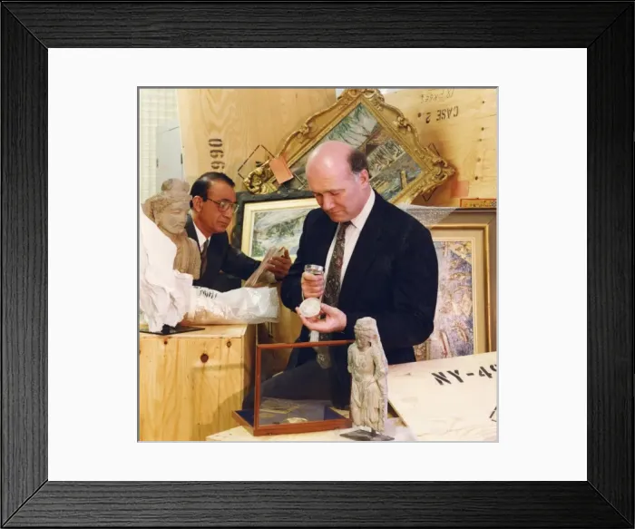 Framed Print : Police experts examine stolen property Framed Print : Police experts examine stolen property