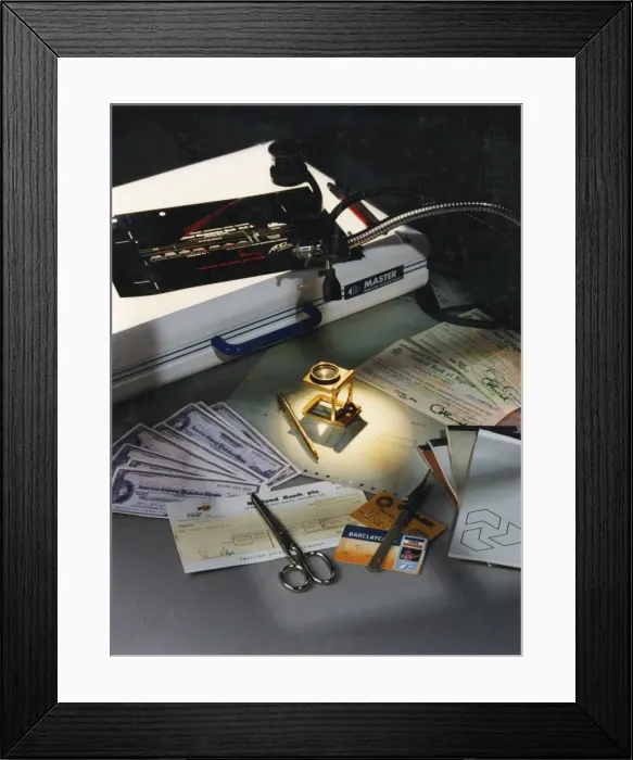 Framed Print : Examining fraudulent financial documentation Framed Print : Examining fraudulent financial documentation
