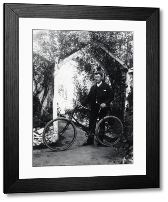 Framed Print : Young man and bicycle, Haverfordwest, South Wales Framed Print : Young man and bicycle, Haverfordwest, South Wales