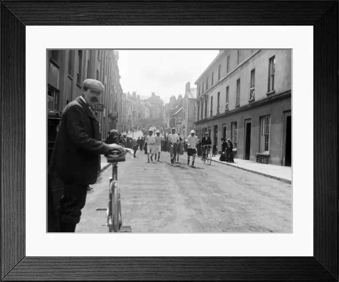 Framed Print : Runners in Victoria Place, Haverfordwest, South Wales