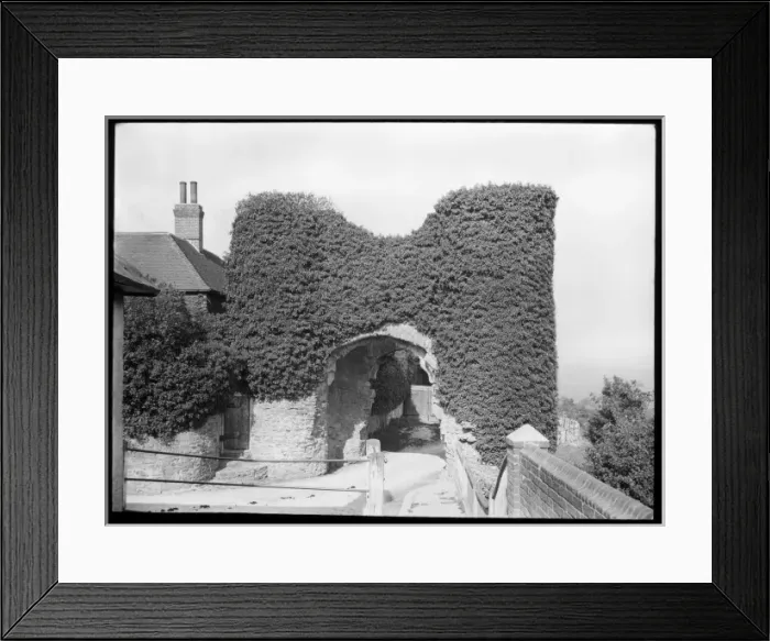 Framed Print : Old stone archway overgrown with leaves Framed Print : Old stone archway overgrown with leaves