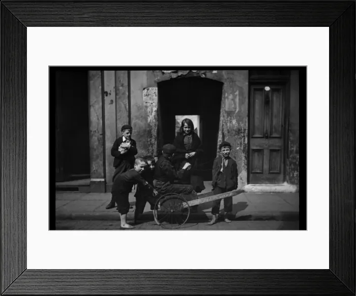 Framed Print : Six children with a makeshift cart in a London street Framed Print : Six children with a makeshift cart in a London street