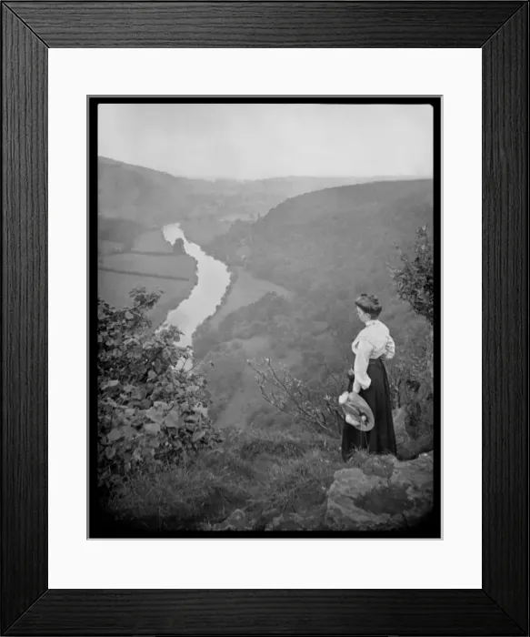Framed Print : Woman looking down into a valley Framed Print : Woman looking down into a valley