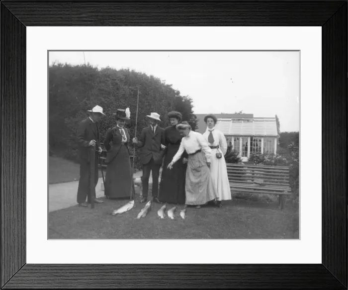 Framed Print : Edwardian friends inspecting a catch of fish, Pembrokeshire Framed Print : Edwardian friends inspecting a catch of fish, Pembrokeshire