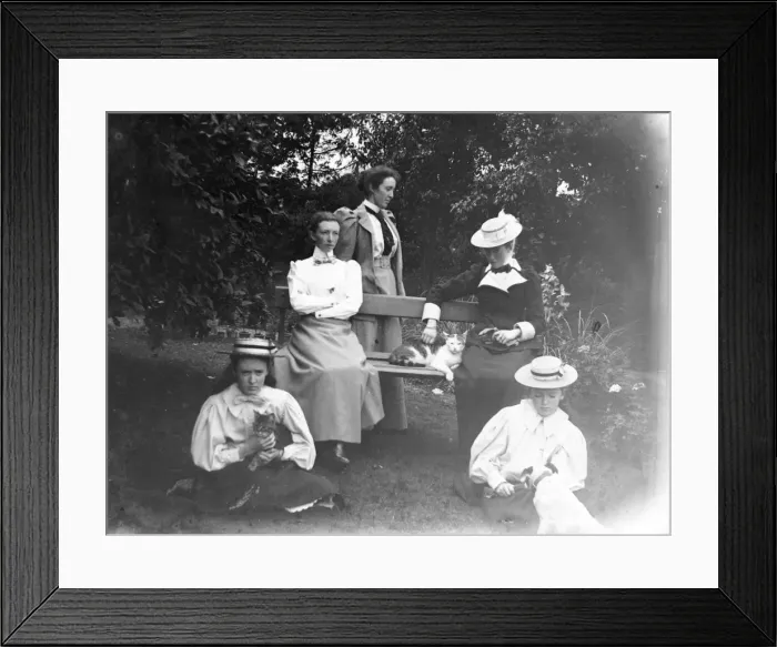 Framed Print : Family group with pets in a Pembrokeshire garden Framed Print : Family group with pets in a Pembrokeshire garden