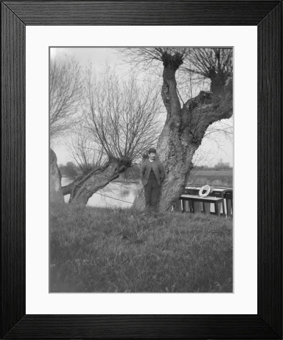Framed Print : Man on canal bank with canal boat, South Wales Framed Print : Man on canal bank with canal boat, South Wales