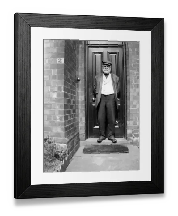 Framed Print : Edwardian workman on his front doorstep, Pembrokeshire