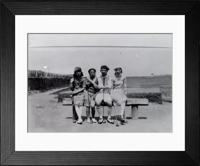 Framed Print : Four local people on a golf course in the Far East Framed Print : Four local people on a golf course in the Far East