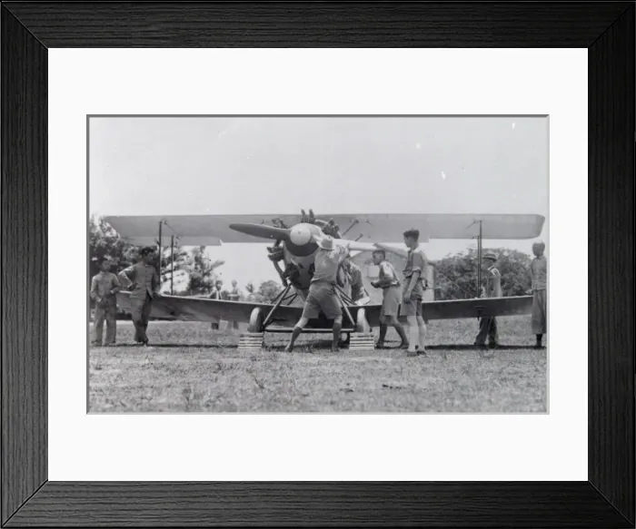 Framed Print : Western men on a trip to the Far East, starting the plane Framed Print : Western men on a trip to the Far East, starting the plane