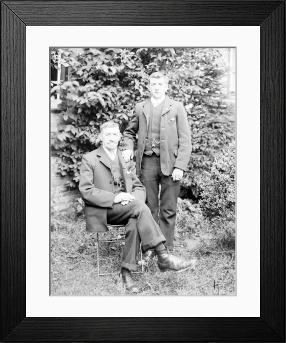 Framed Print : Father and son in a garden, Mid Wales Framed Print : Father and son in a garden, Mid Wales