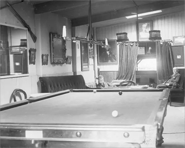 Snooker room with two players